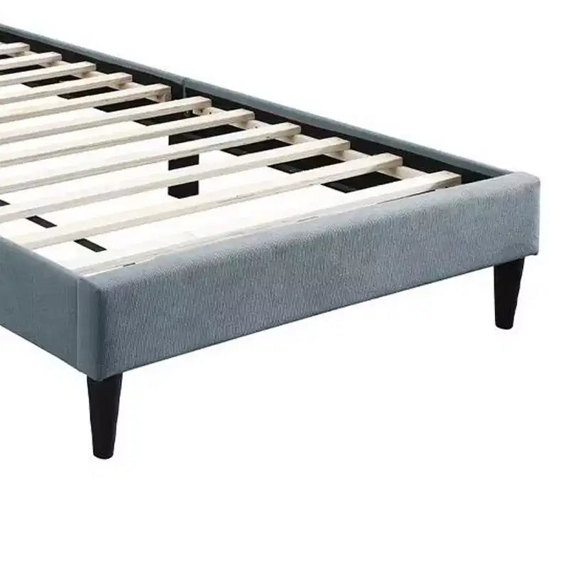 Lit simple avec tête de lit capitonnée, revêtement en lin gris clair doux